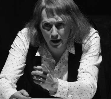 Isabella Jarrett as John in 'Desk Job'